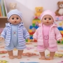 Кекла бебе с мигащи очички и зимни дрехи, снимка 3