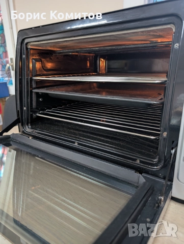 Електрическа фурна Delonghi EO32852, снимка 4 - Печки, фурни - 51583104