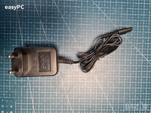 Оригинален захранващ адаптер KHG030030D-2 3V 300mA, снимка 5 - Друга електроника - 53414838