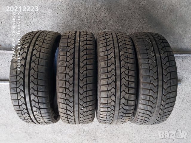 4 броя зимни гуми 185/55R15 momo, снимка 1 - Гуми и джанти - 41633650