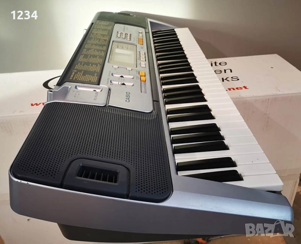 Синтезатор клавир CASIO LK-110 пиао със светещи клавиши и вход за микрофон 5 октави, снимка 2 - Синтезатори - 52638447