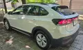 VW Taigo 28 000 км *** Първи собственик. Купена от България. В гаранция до 2028 г. *** Като нов, снимка 2
