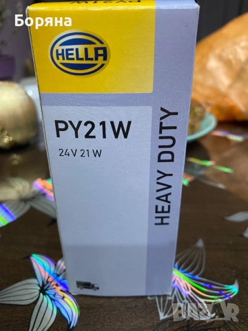 Крушки за товарни автомобили HELLA 24V21W, снимка 2 - Крушки - 52067998