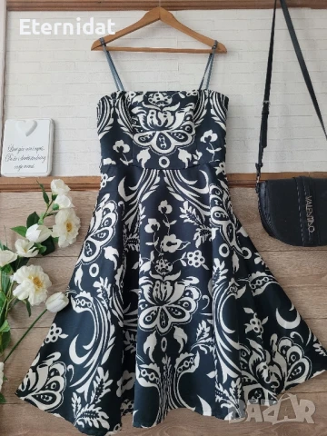 Разкроена елегантна рокля 