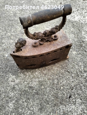 Стара ютия на жар