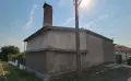 Подържан имот с излаз на две улици,2 имота в 1 със жилищни пристройки и складови помещения, снимка 7