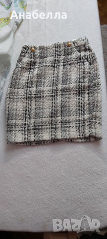 Къса буклена пола