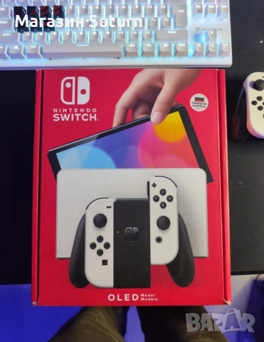 Nintendo switch oled с две игри и една година гаранция, снимка 2 - Nintendo конзоли - 53348478