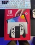Nintendo switch oled с две игри и една година гаранция, снимка 2