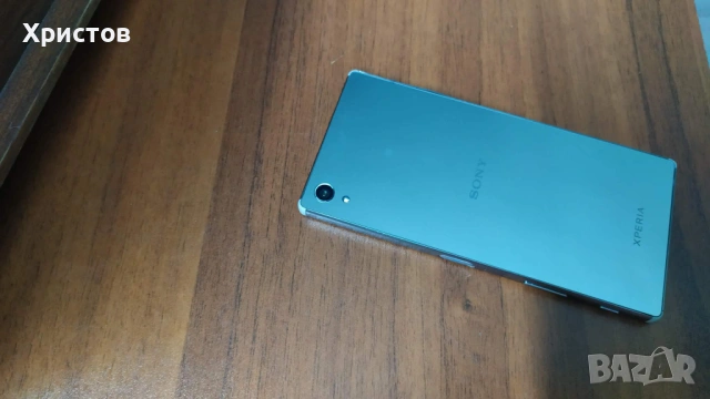 Супер тънък метален телефон SONY с ОГЛЕДАЛЕН гръб отлично работещ от чужбина