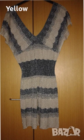 като нова златисто-черна рокля