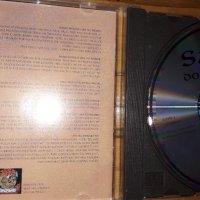 Компакт диск на хеви металягите  - Saxon –Dogs Of War 1995, снимка 4 - CD дискове - 41663250