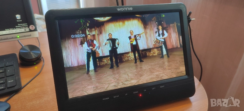 Портативен 10.5 инчов DVD/CD/MP3/USB/SD медия плеър Wonnie, снимка 1