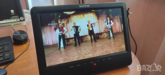 Портативен 10.5 инчов DVD/CD/MP3/USB/SD медия плеър Wonnie