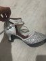 Нови сребристи обувки , снимка 1 - Дамски обувки на ток - 40644347