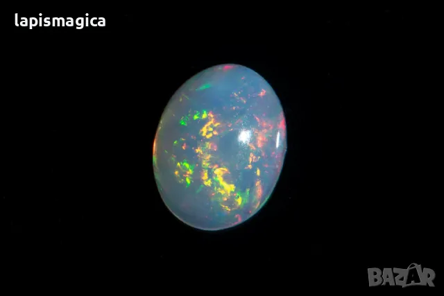 Етиопски опал 1.32ct овален кабошон, снимка 4 - Други - 48310474
