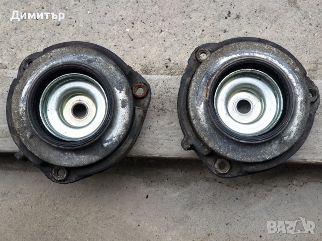 Оригинални тампони с лагера  за предни амортисьори на Пасат В7