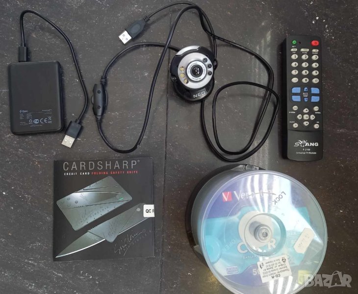 Външна батерия, камера, универсално дистанционно, дискове и карта-нож, снимка 1
