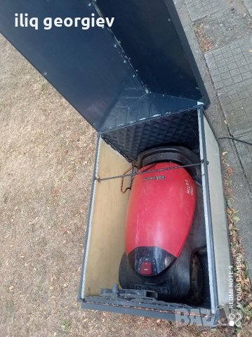 гараж за косачка робот