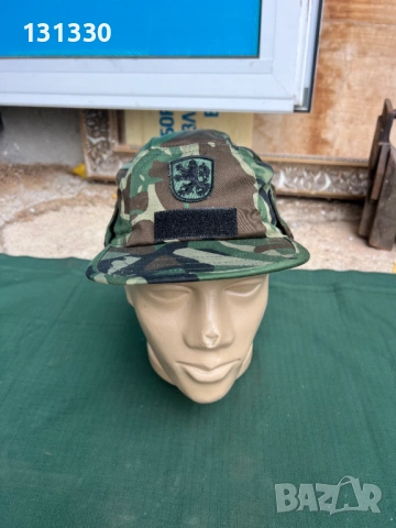 Продавам камуфлажна шапка 