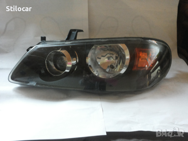 Фар Nissan Almera N16 03г ляв