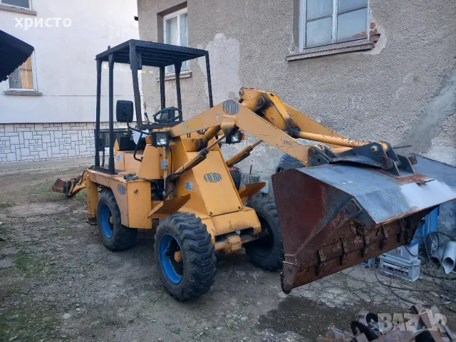 комбиниран багер