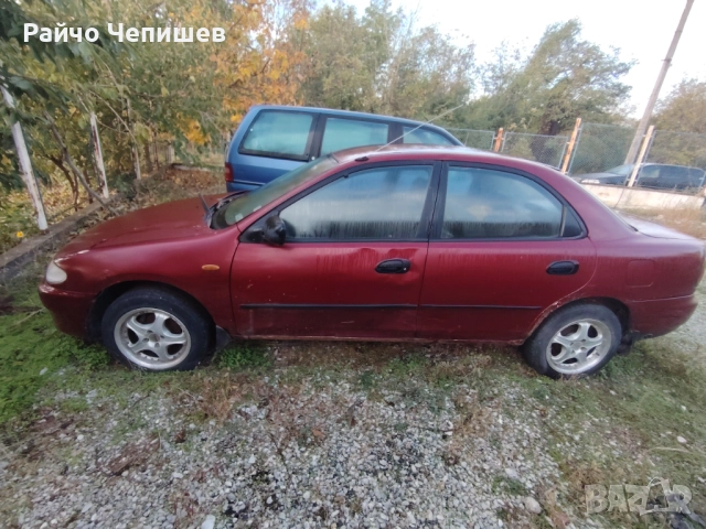 Мазда 323 на части