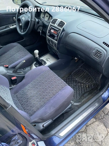 Мазда 323f 1.6 газ инж , снимка 8 - Автомобили и джипове - 53295952