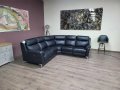 Черен кожен ъглов диван с електрически релаксиращ механизъм, снимка 1 - Дивани и мека мебел - 42514542