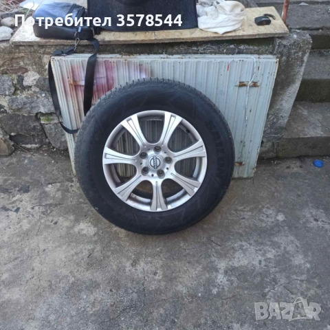 Гуми с джанти Нисан 215/70/16, снимка 2 - Гуми и джанти - 53666180