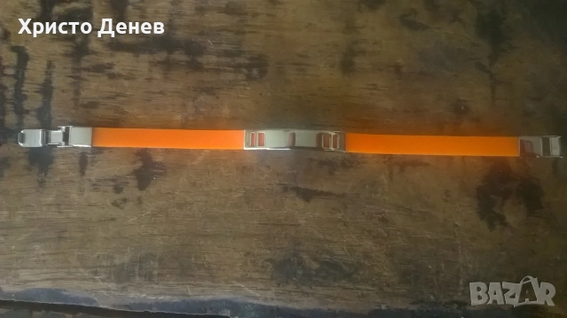 гривна силикон оранжева и стомана дизайнерска