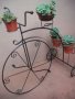 Цветарници колело от ковано желязо , снимка 1 - Градински мебели, декорация  - 40378170