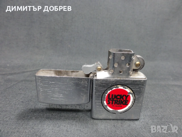 СТАРА РЕТРО РЕКЛАМНА БЕНЗИНОВА ЗАПАЛКА LUCKY STRIKE, снимка 3 - Антикварни и старинни предмети - 53280637
