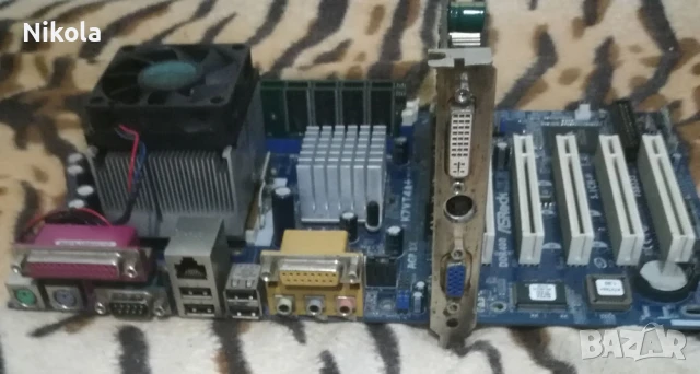 Продавам/Бартер Дъно AS Rock K7VT4A PRO с процесор AMD Sempron 2500+, Видеокарта GV-N55128DP и Памет, снимка 3 - Дънни платки - 51293267