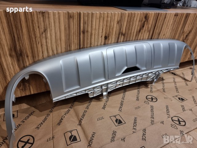 Оригинална добавка за задната броня при VW Passat B7 Alltrack