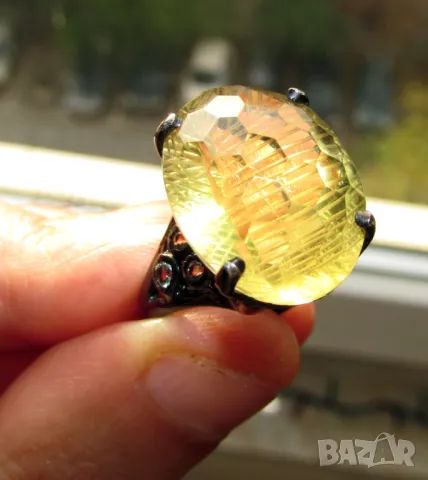 925 сребърен пръстен, родиево покритие с лимонов кварц 18 карата, размер 21x16мм, общо тегло 10.1гр.