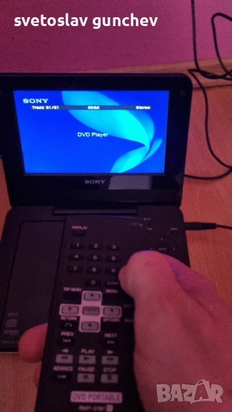 портативен двд/сд/мп3 плеър с батерия и адаптер за ел.мрежата, снимка 1
