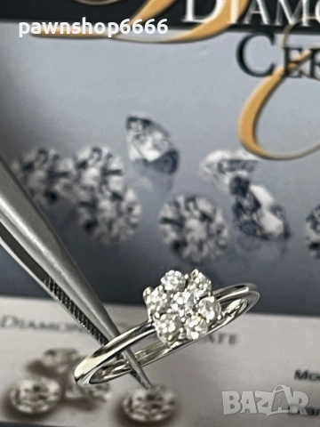 Златен пръстен 18К бяло злато с диаманти – елегантност с характер