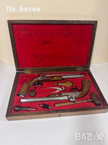 Чифт капсулни пистолети