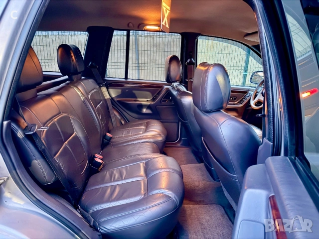 Jeep Grand Cherokee 4.7 / Limited / BRCгаз / Отлично Състояние, снимка 13 - Автомобили и джипове - 53092559