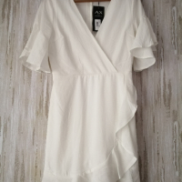 AX PARIS нова дамска рокля с волани в бял цвят р-р M/L (EU 40 - UK 12), снимка 17 - Рокли - 44599319