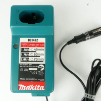 Зарядно за кола Makita DC1412 - зарежда 7.2v / 9.6v / 12v / 14.4v батерии, снимка 1 - Други инструменти - 36329978