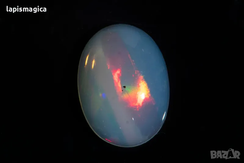 Етиопски опал 1.81ct овален кабошон, снимка 1