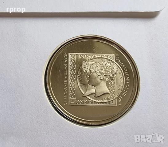 Англия .
Възпоменателна монета с образът на Уилям Уайъм.
С лика на монетата 1 пени. В плик.
