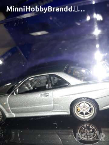 NISSAN  SKYLINE GT-R R 34 V spec AUTOart 1.43  Top Model , снимка 5 - Колекции - 39258739