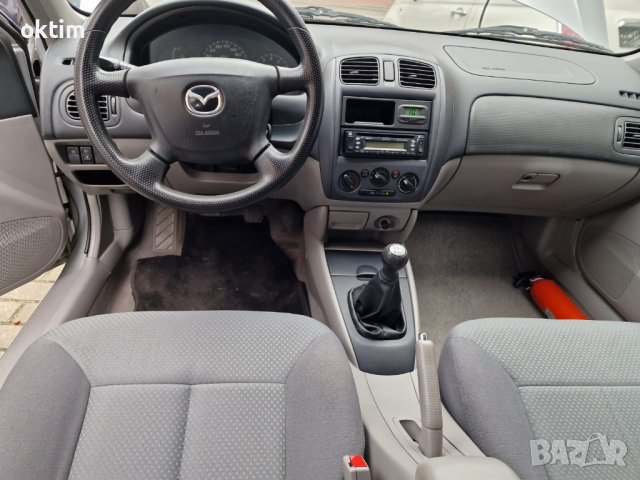 Мазда 323 бензин нова газова инсталация перфектно състояние, снимка 6 - Автомобили и джипове - 40454059