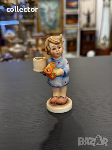 Порцеланова фигурка е "Момиче с букет" - Goebel Hummel. №7886