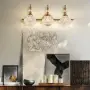Тройна стенна лампа CHILDHOOD с кристални абажури и антично месингово покритие, снимка 3