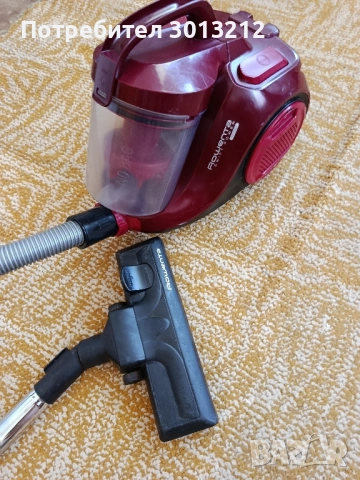прахосмукачка ровента без забележки със контейнер .