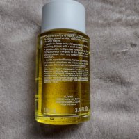 Clarins Tonic Body Treatment Oil "Firming/Toning" Масло за тяло, снимка 3 - Козметика за тяло - 34295967
